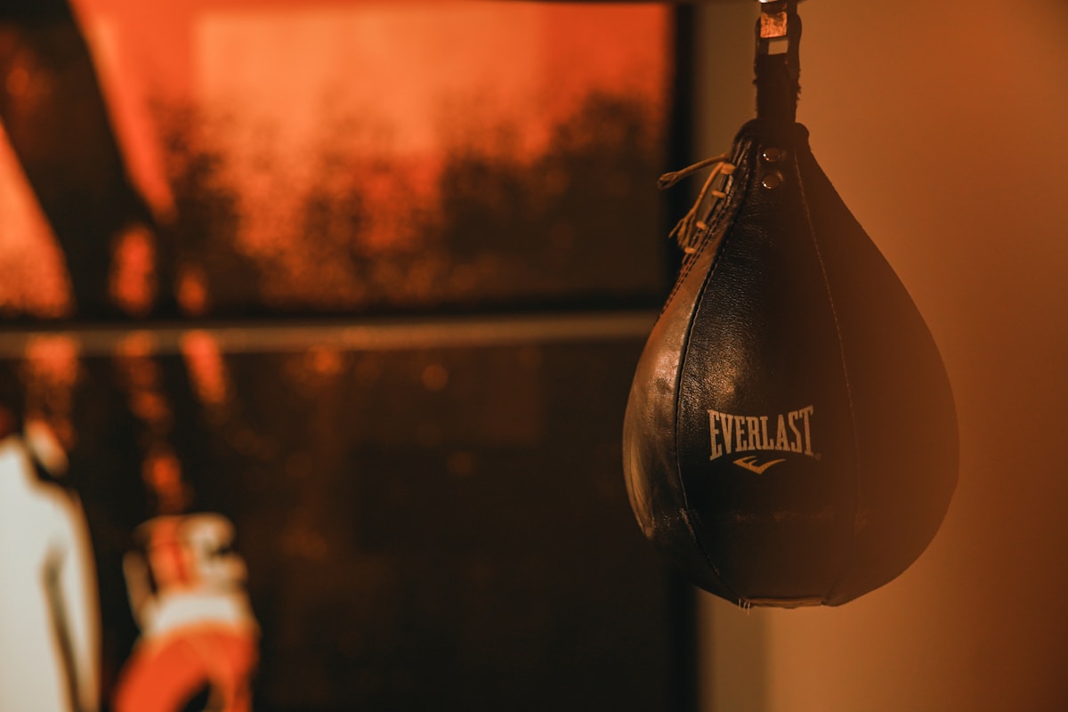 Pair of boxing gloves hanging on hook - NFL Camp position battles