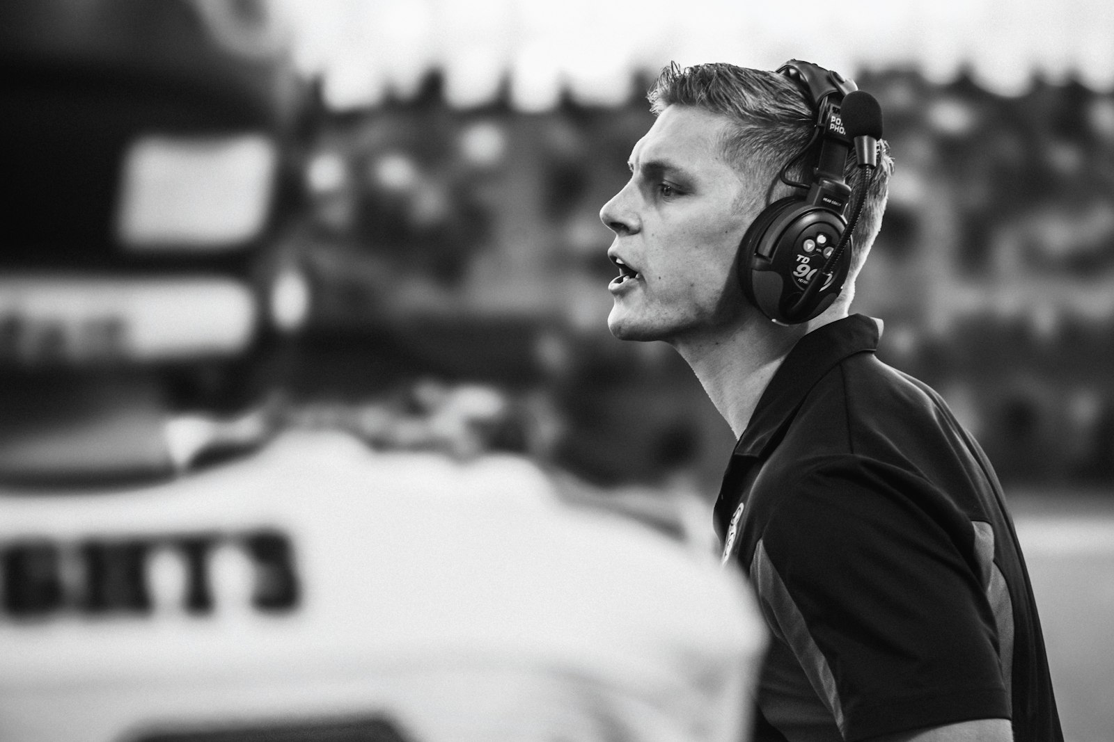 Football coach on the field, used to illustrate the late-season analytical context of the 2025 college football conference championship race.