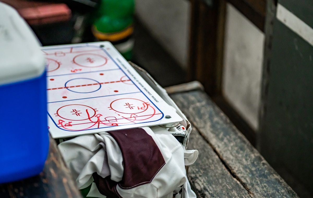 Tactics clipboard with play diagrams - NFL Minicamps playbook