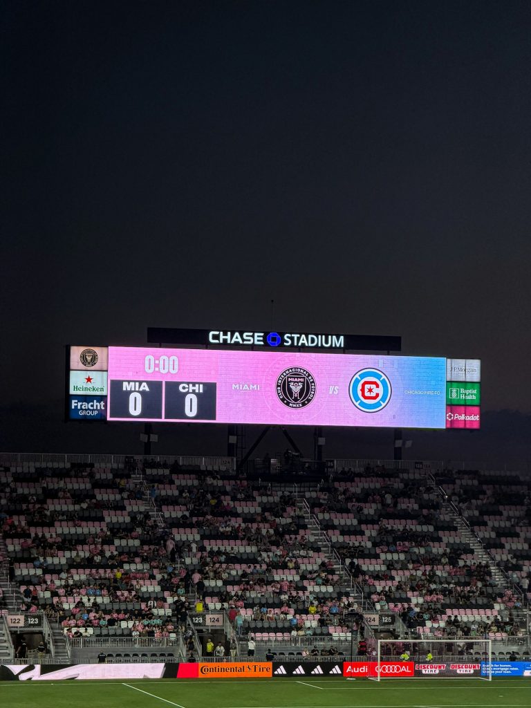 A soccer stadium scoreboard showing the score during a game.