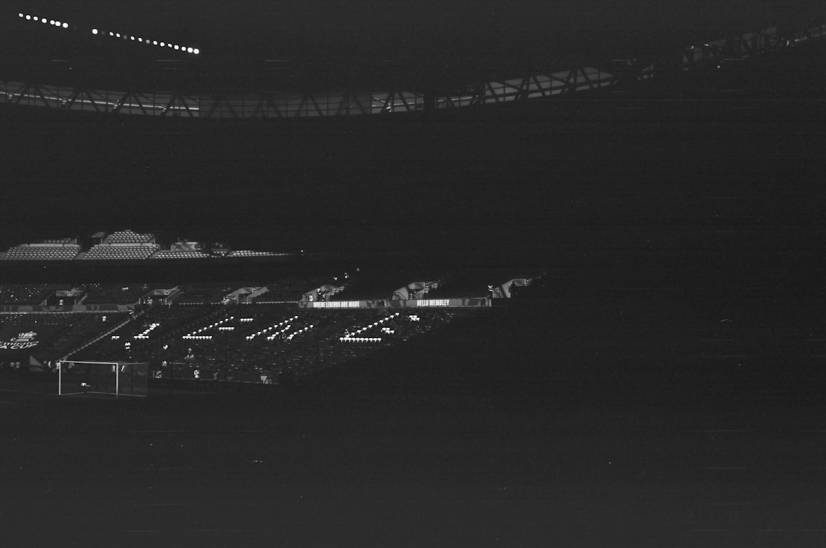 Dimly lit stadium at night with faint lights - NFL Preseason Week 1 garbage-time