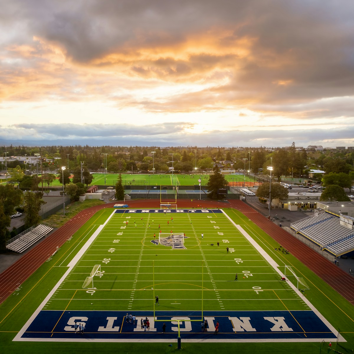 Aerial football field at sunset - CFB Week 0/1 kickoff preview