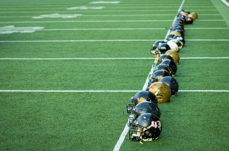 Line of football players on field - NFL Preseason Week 3 starters