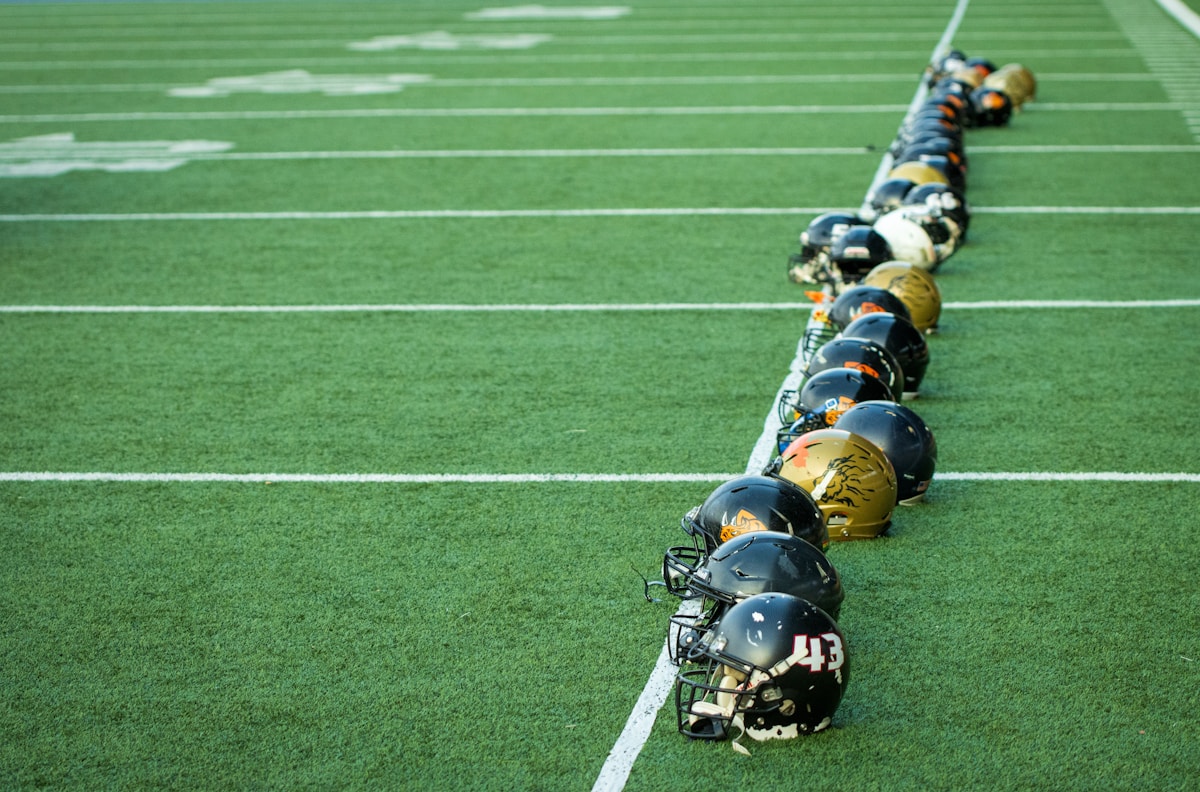 Line of football players on field - NFL Preseason Week 3 starters