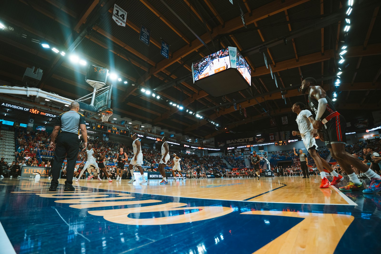 Basketball players competing during a game, used to illustrate Florida's 2025 NCAA Tournament championship through the analytical lens.
