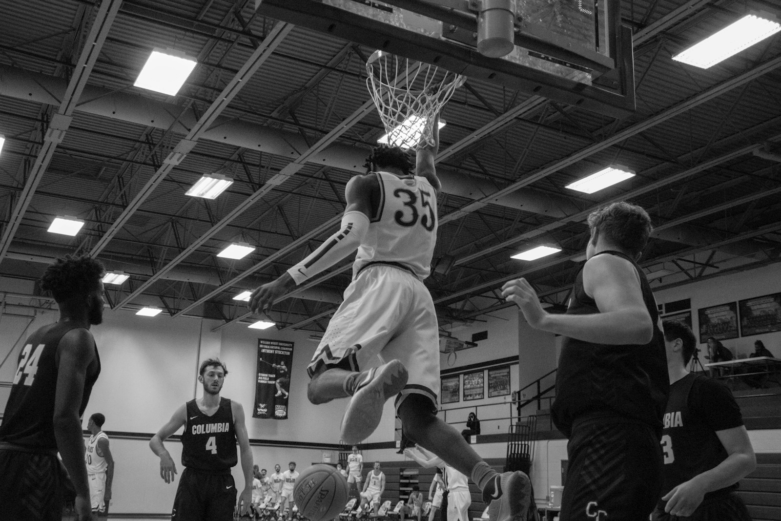 Grayscale photo of NBA basketball game illustrating decades of Finals Game 1 history