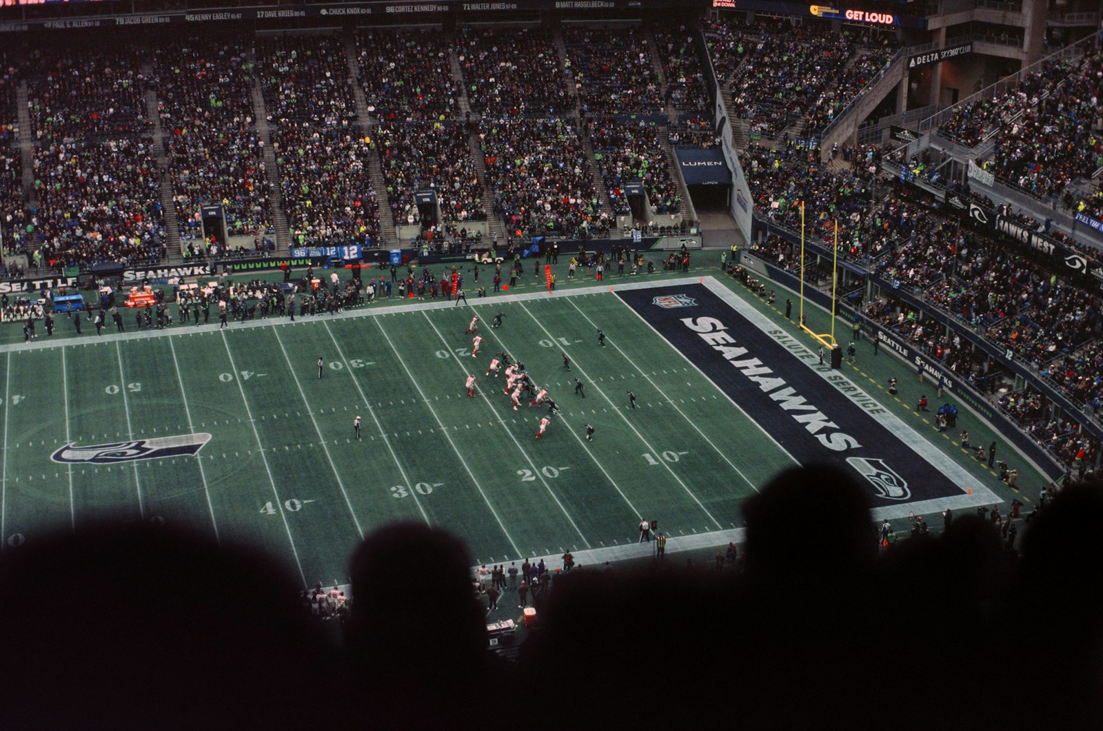 NFL stadium with fans, used to illustrate the analytical context behind the 2025 NFL Draft's top picks.