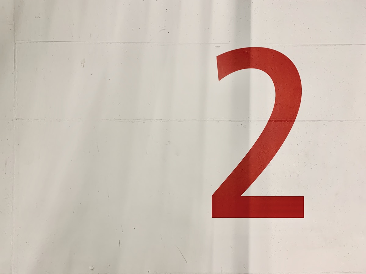 Large red and white number two on wall - NBA Finals Preview two key numbers