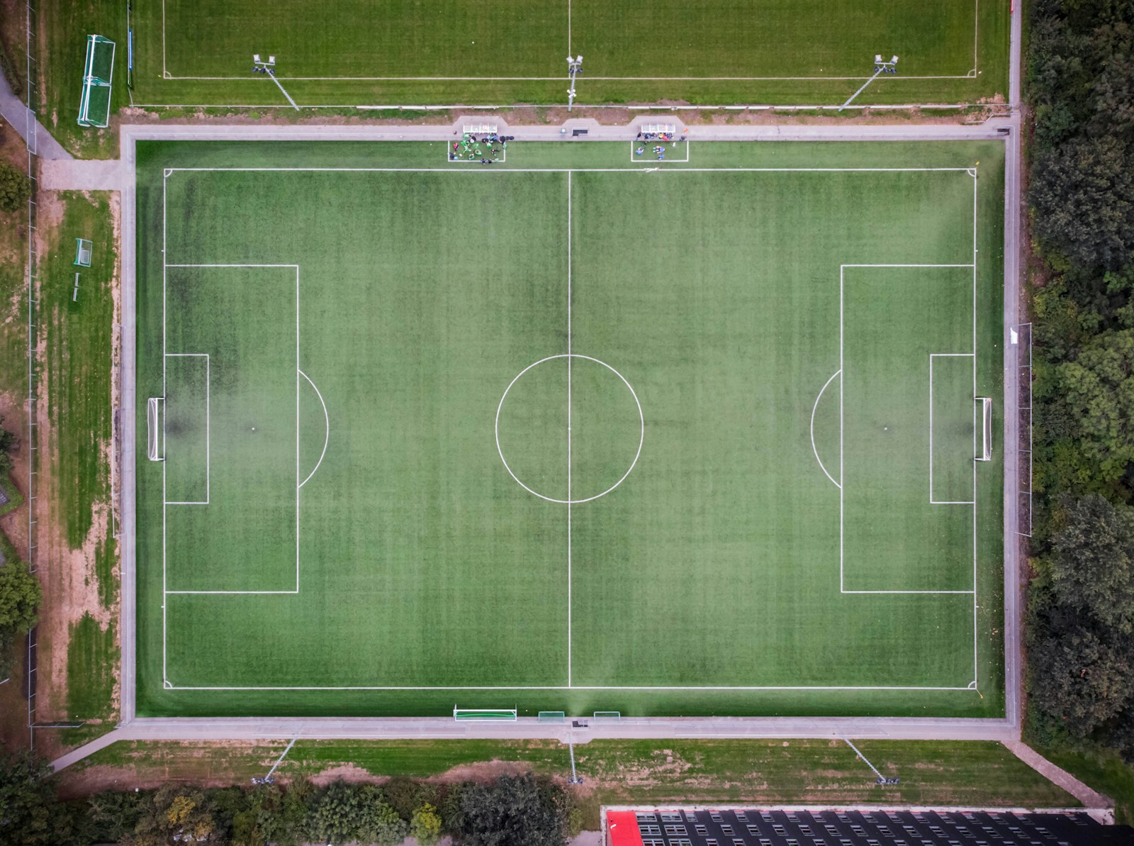 Empty football field aerial view illustrating pre-World Cup international friendlies