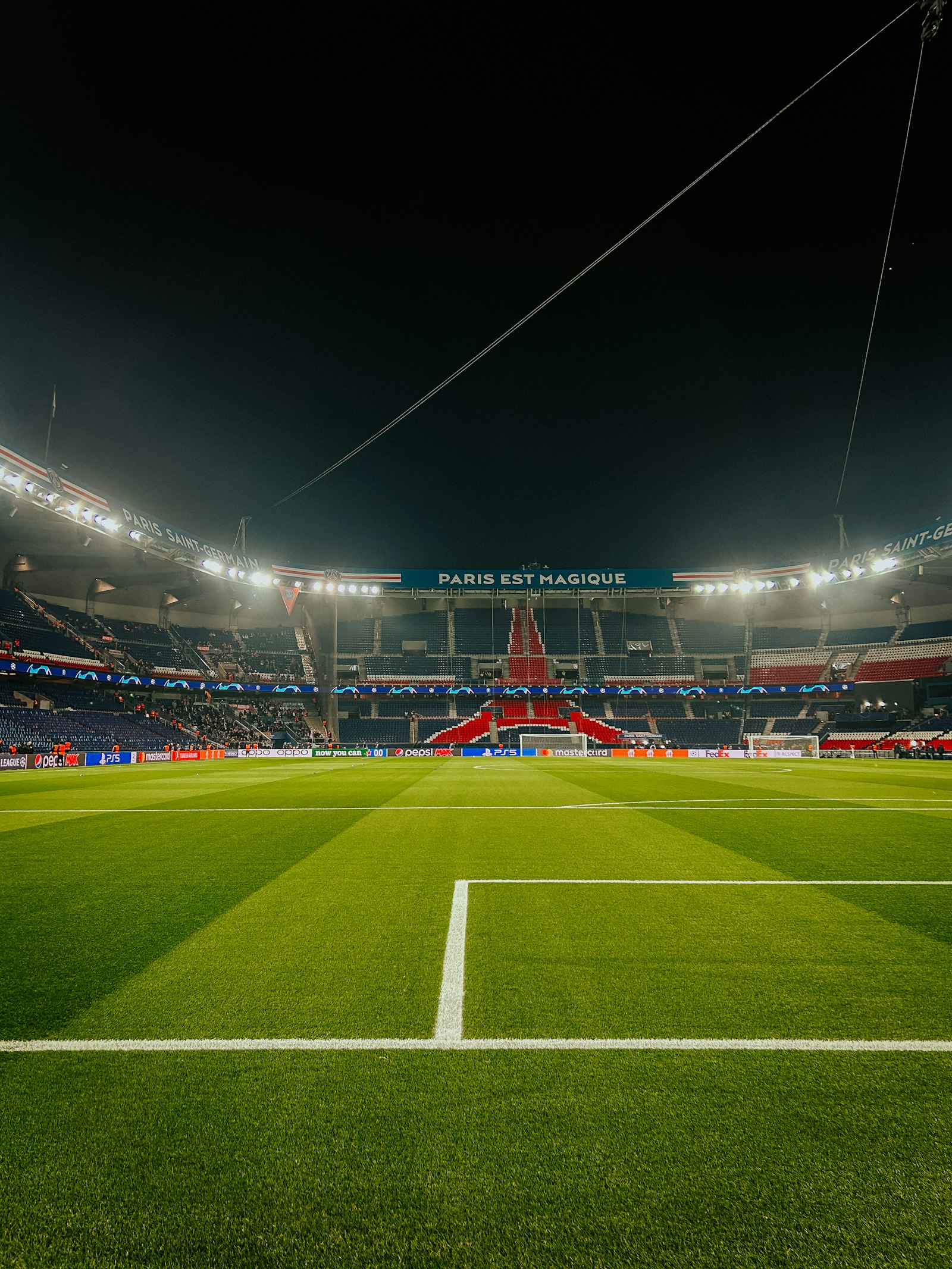 A soccer stadium illuminated at night, used to illustrate the Champions League knockout stage atmosphere and the xG framework for reading two-leg ties.