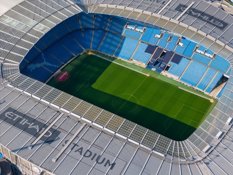 Aerial view of soccer field in stadium - CFB ACC conference preview