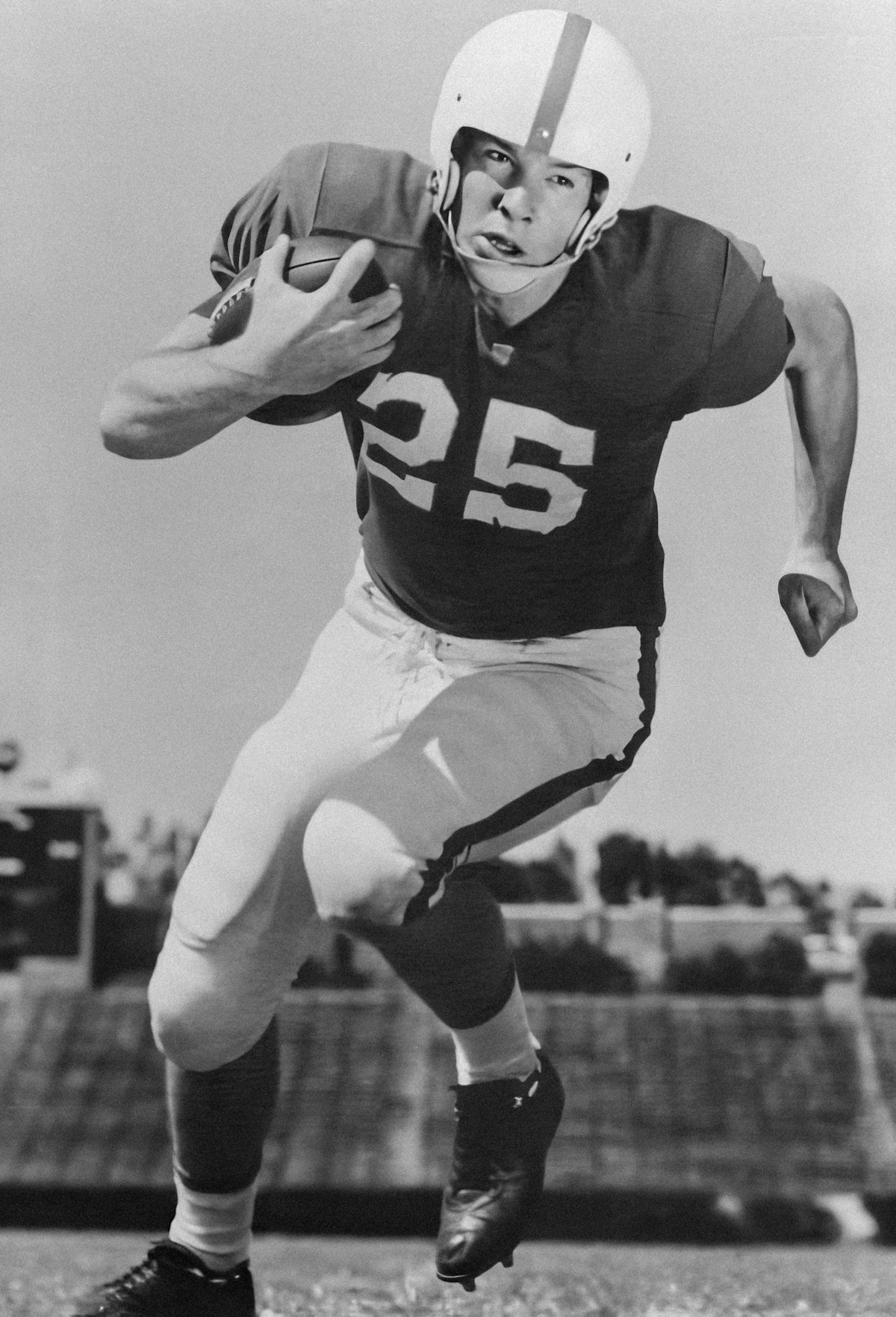 Veteran football player running with ball - NFL veteran position battles