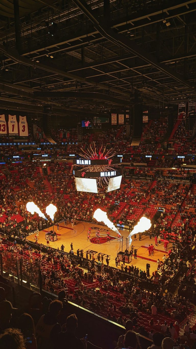 Basketball court filled with crowd - March Madness 2025 Final Four #1 seeds convergence