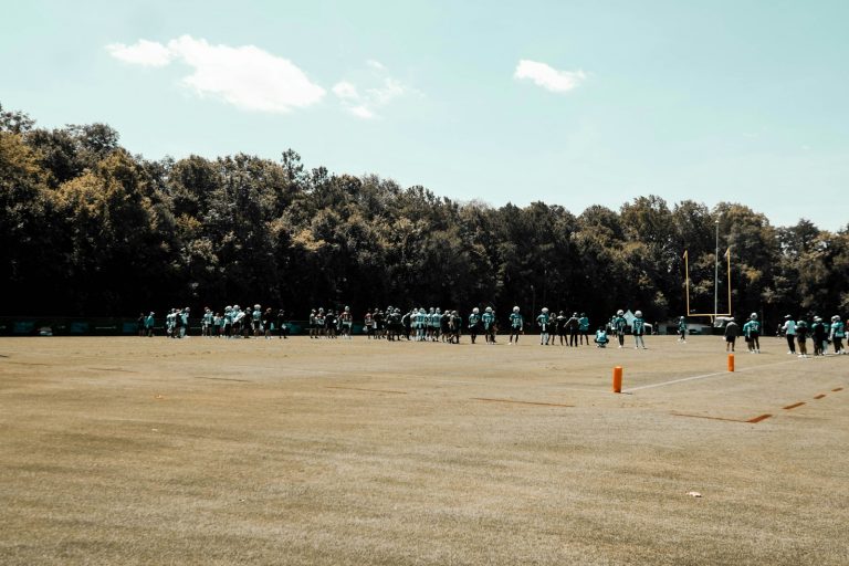 Football team training on field - NFL joint practices 2024 predictions revisited