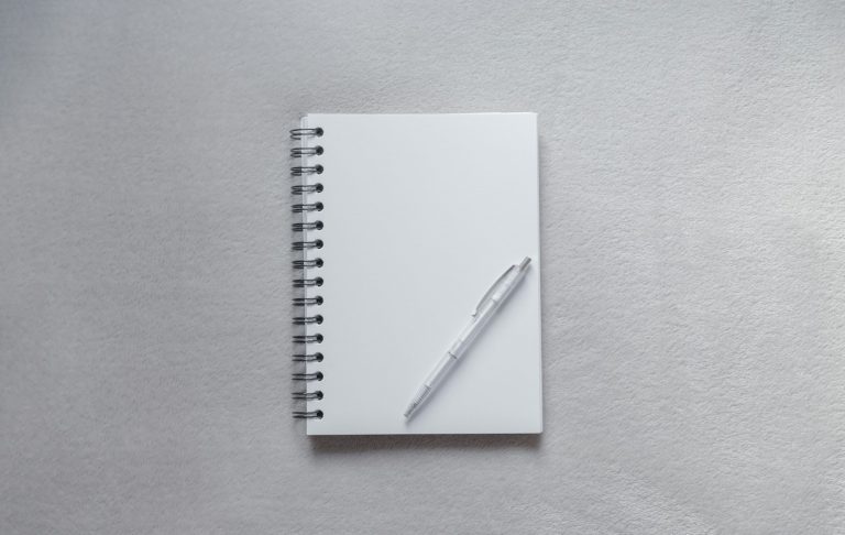 Open notebook on editorial desk - SportsHighLight launch piece