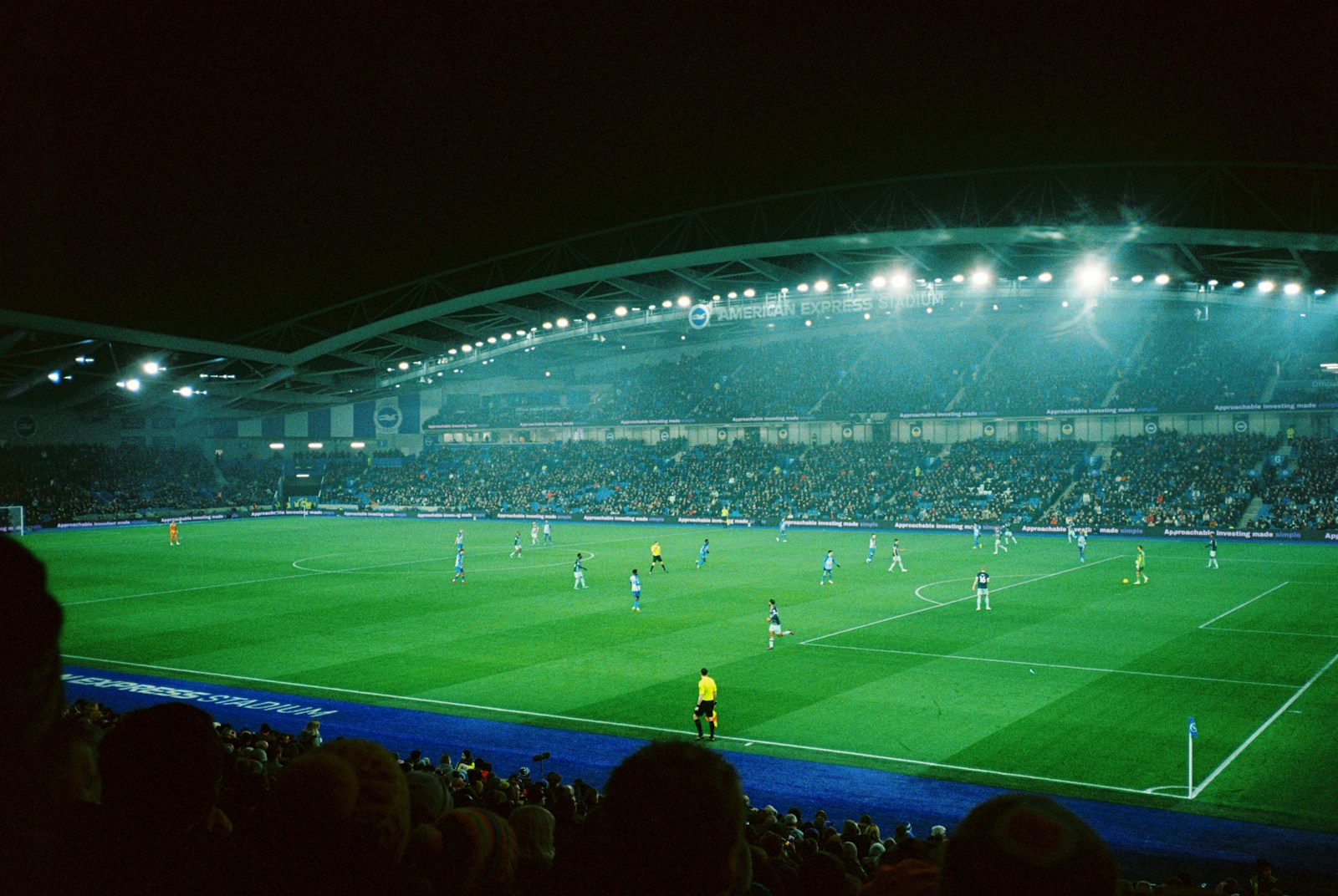 Soccer match at night in lit stadium - UCL Round of 16 Liverpool vs PSG