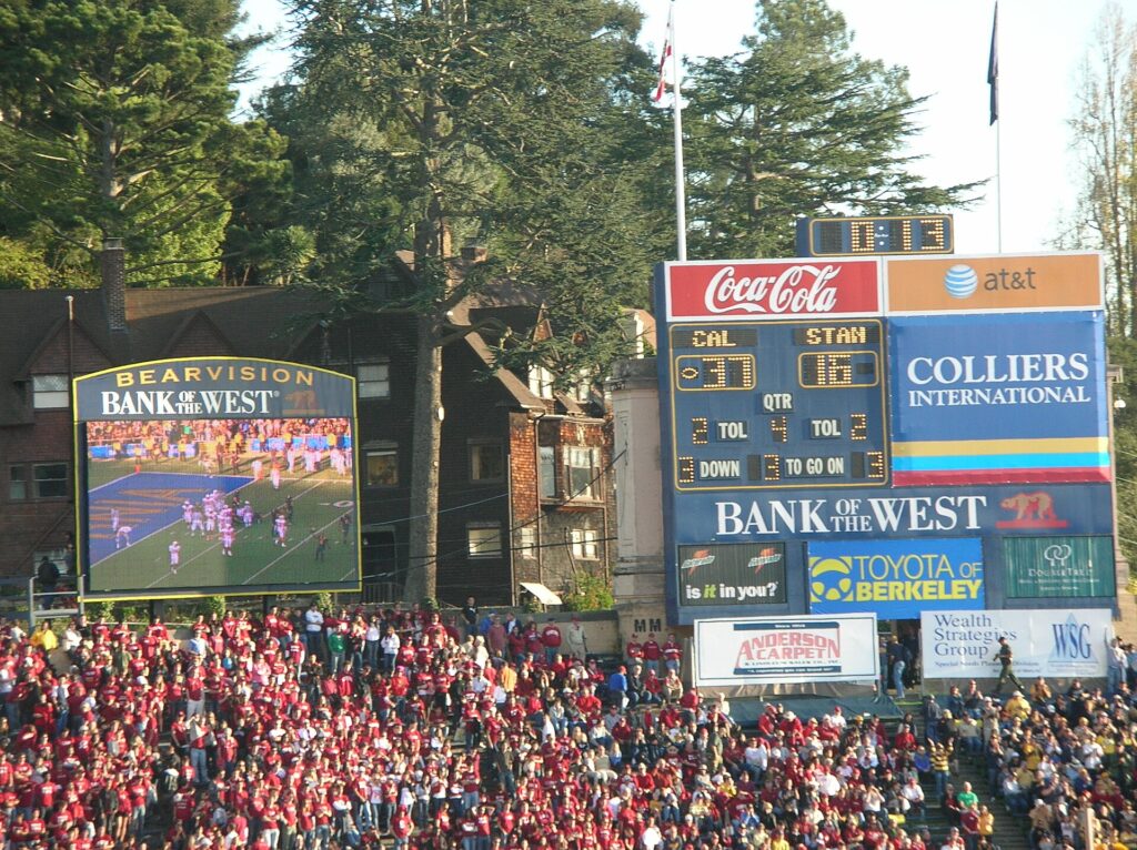A stadium scoreboard showing the game clock counting down in the closing minutes