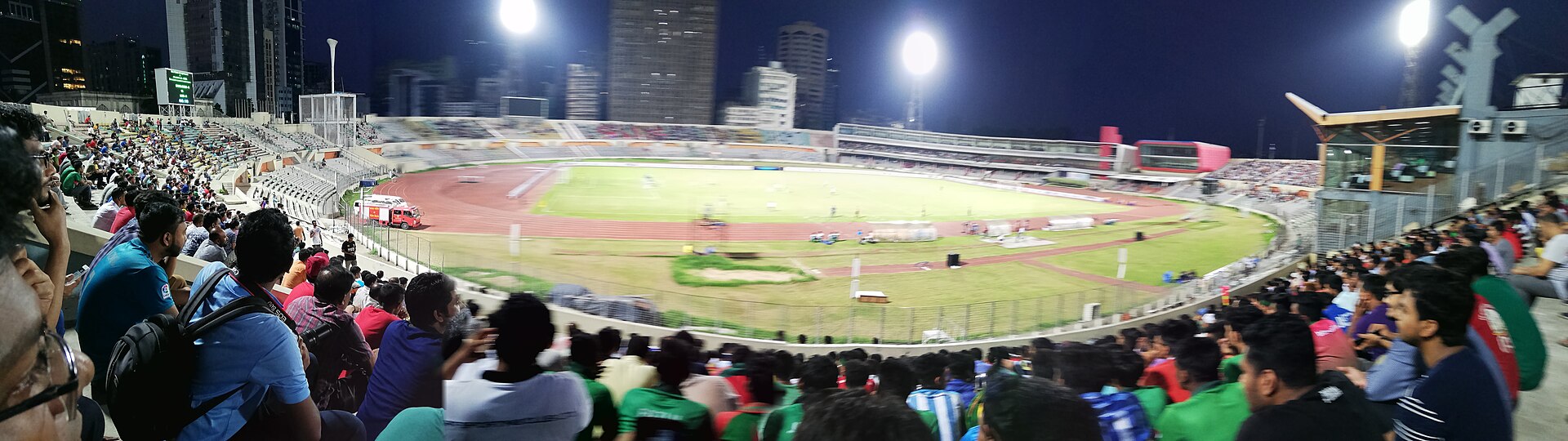 stadium crowd sound engineer mixing desk
