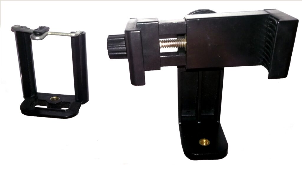 A phone clamped to a tripod recording a wide view of a training session